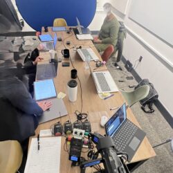 Deposition recording gear in use on conference room table