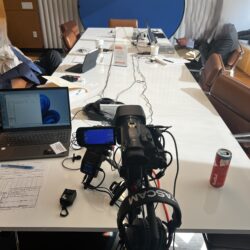 Deposition recording gear in use on conference room table